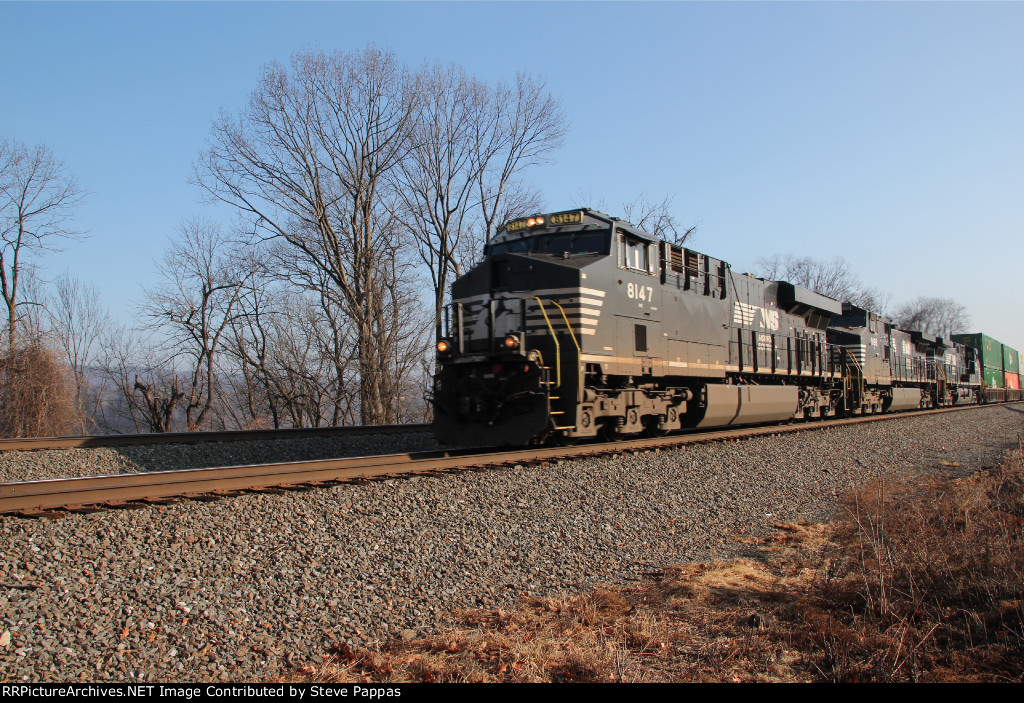 NS 8147 leads train 21E through MP116 at Cove PA